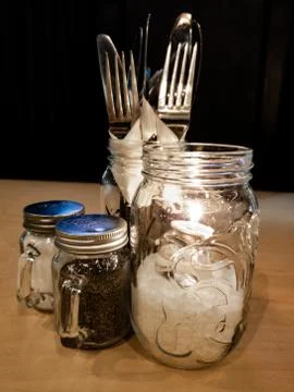 Utensil layout on table Stock Photos