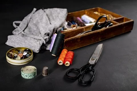 Utensils on the table in the tailor's workshop. Accessories necessary for tai Stock Photos