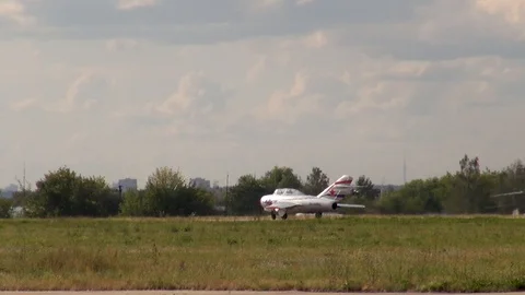 UTI MiG-15 (NATO: dwarf) soviet training aircraft steers along runway. Stock Footage 120804227