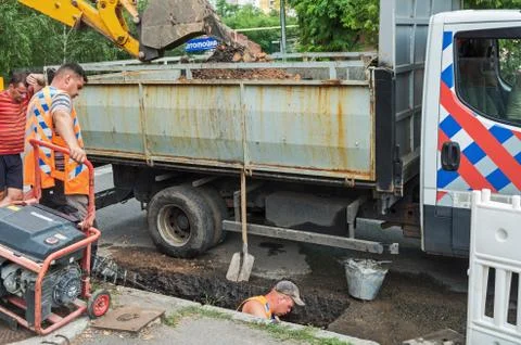 Utilities make preventive repairs to storm sewers Stock Photos