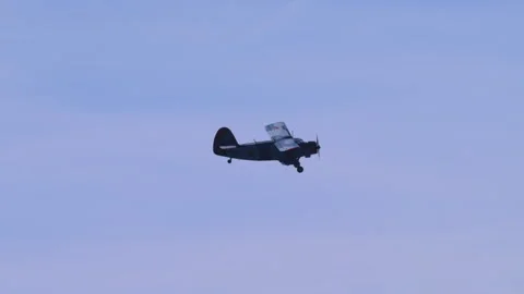 Utility Aircraft Antonov AN-2 Level Flight Alpine Sky Profile Tracking Shot Stock Footage 332325146