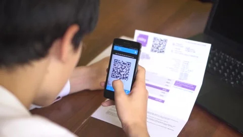 Utility bill online payment using QR code and mobile app Stock Footage 139079984