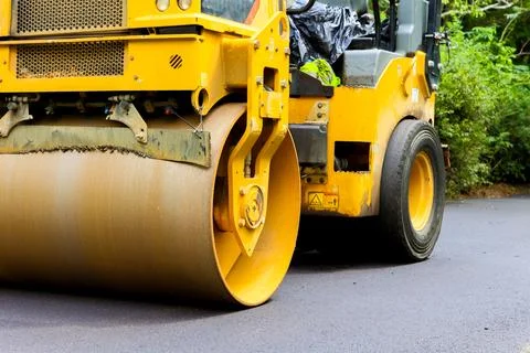 Utility Compactor machine for asphalt work on roads, parking lots, etc. Stock Photos