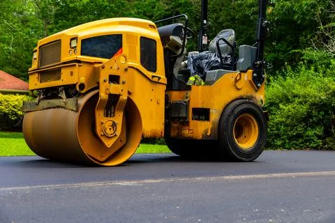 Utility Compactor machine for asphalt work on roads, parking lots, etc. Stock Photos