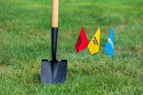 Utility flags shovel Stock Photos