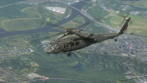 The utility helicopter flies high in the sky. Stock Footage 219213089