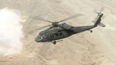 The utility helicopter flies high in the sky. Video stock 331740226