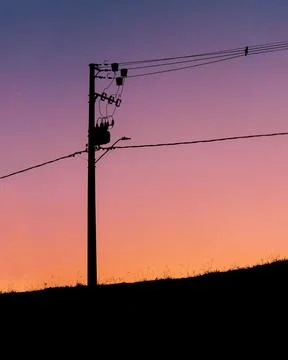 Utility Pole after sunset Stock Photos