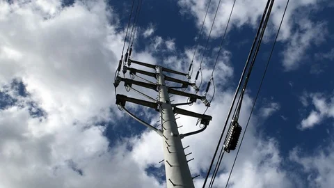 Utility pole, blue sky with white clouds Video stock 126777557