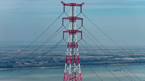 Utility pole consist of steel structure framing to support carry high-voltage Stock Footage 326063513