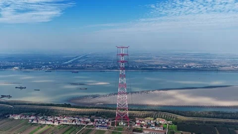 Utility pole consist of steel structure framing to support carry high-voltage Stock Footage 326078752