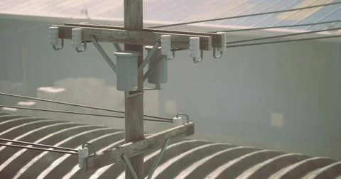 Utility pole with power lines in a hazy industrial setting Stock Illustration