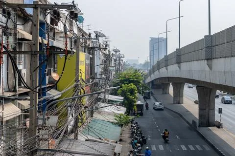 Utility poles and elevated road along Bangkok street Fotos de archivo