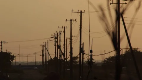 Utility poles sunset Stock Footage 75069663