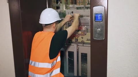 A utility service engineer replaces worn parts to ensure the safety of home Vídeos de archivo 266229704