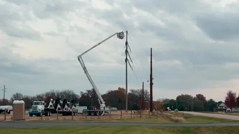 Utility Worker, Bucket Truck Working - Wide - Bettendorf, Iowa - Oct 30, 2024 Stock Footage 289912376