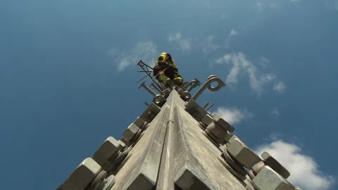 Utility Worker High Above Ground on Transmission Tower Stock-Footage 346302654