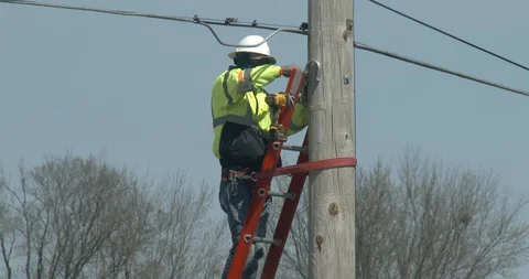 Utility Worker on Ladder with Face Mask - COVID-19, Coronavirus Stock Footage 128145751