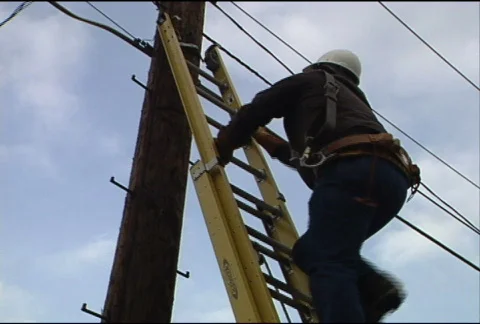Utility Worker on Pole 084 Stock Footage 488190