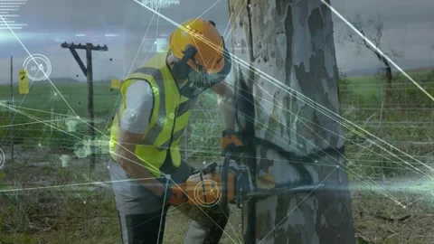 Utility worker powering saw, cutting trunk to protect utility lines while HUD Stock Footage 329594197