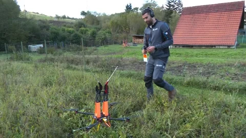 Utility Worker Preparing Specialized Drone for Power Line Work Stock-Footage 346307185