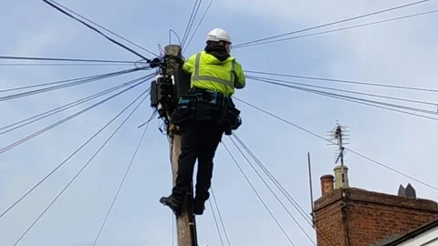 Utility Worker Working on Overhead Cables in Warwick, England, UK (29 Sept 2026) Stock Footage 346711950