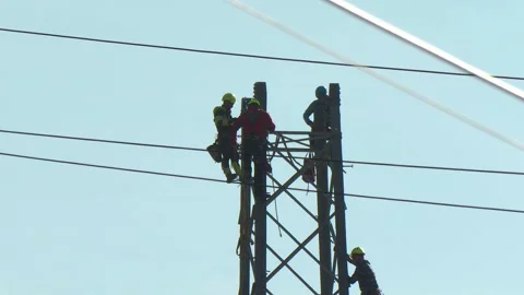 Utility Workers Assembling High Voltage Transmission Tower Stock Footage 341968076