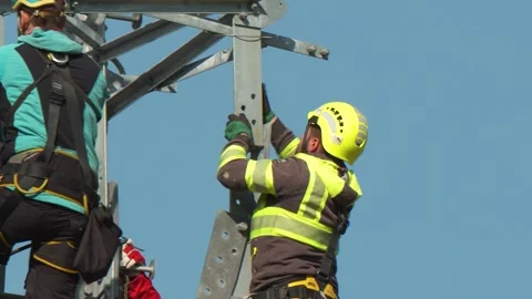 Utility Workers Assembling High Voltage Transmission Tower Stock-Footage 346300075