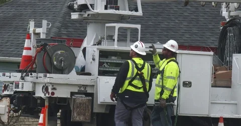 Utility Workers Discussing Work Plans Stock Footage 81006424