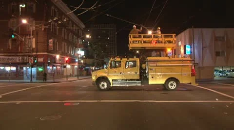 Utility Workers Inspect Overhead Wires in SF Part 2 Stock Footage 10749556
