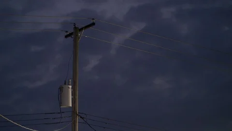 Utitlity Pole w time lapse clouds Stock Footage 128252189