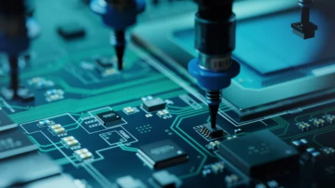 Utomatic Pick and Place machine quickly installs Components on Circuit Board Stock Footage 241490100