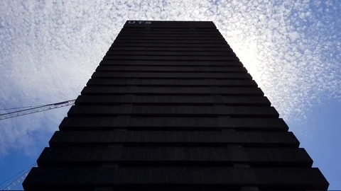 UTS University of Technology Sydney Tower Silhouette with sun and clouds Stock Footage 86879278