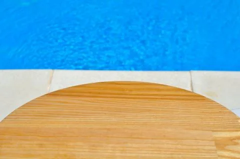 ?utting board on a background of pool Stock Photos