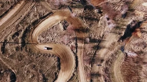 Utv car makes turns on the track. Top view from drone. Stock Footage 61723132