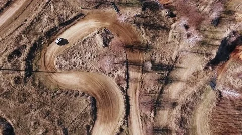 Utv car makes turns on the track. Top view from drone. Stock Footage 61723350
