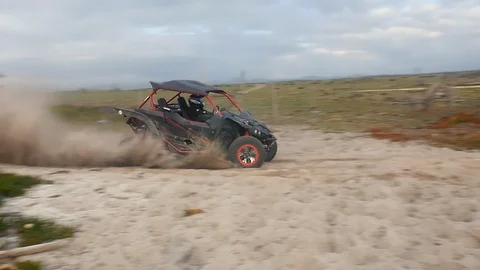 UTV drifting in sand SLOW MOTION. Stock Footage 91591318