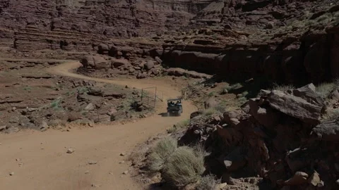 UTV off road on Chicken Corners trail near Moab Utah with canyon cliffs Stock Footage 333228082