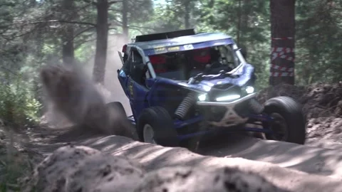 UTV Off Road Extreme Racing in forest. Fast rally car extreme racing Stock Footage 247197220