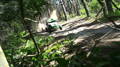 UTV Off Road Extreme Racing. UTV overcome jumps slow motion Stock Footage 113566603