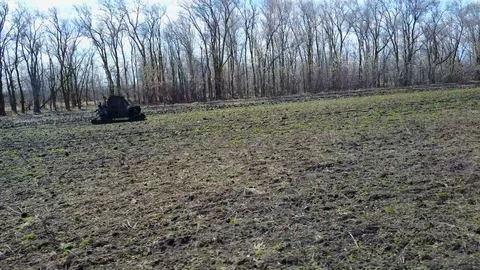 UTV off road four wheel drive sport car driving up the hill to the creek. 4K Video stock 75229048