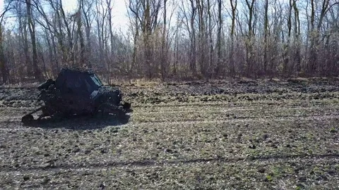 UTV off road four wheel drive sport car driving up the hill to the creek. 4K Video stock 75229754