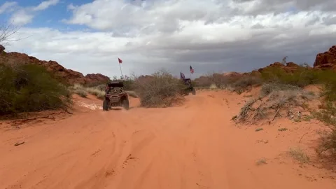 UTV Off-Road Vehicles Racing Through Sandy Desert in Logandale, Nevada Stock Footage 313914878