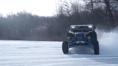 UTV Off Road Winter Extreme Racing. UTV Race car drifting on snow Stock Footage 247197495