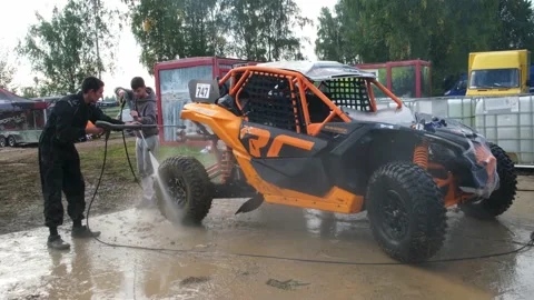 UTV sport buggy washed by Karcher machine Stock Footage 189055199