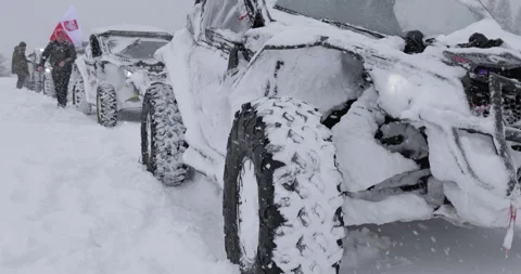 UTV Vehicles on Snowy Trail in Romania with Polish Flag Stock Footage 293468253