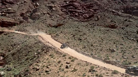 UTVs driving experience along Chicken Corners trail in Moab canyon desert Stock Footage 333715794