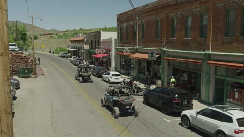 UTVs driving through main street of mining town of Jerome, Arizona 스톡 동영상 212264909