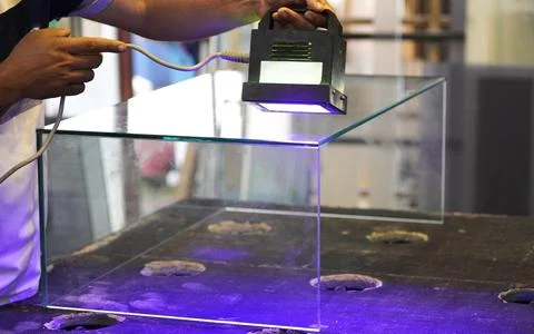 A UV lamp for curing glue. Stockfoto's