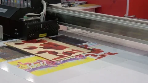 UV-LED hybrid printer IQDEMY, close up view of printing process Stock Footage 80987468